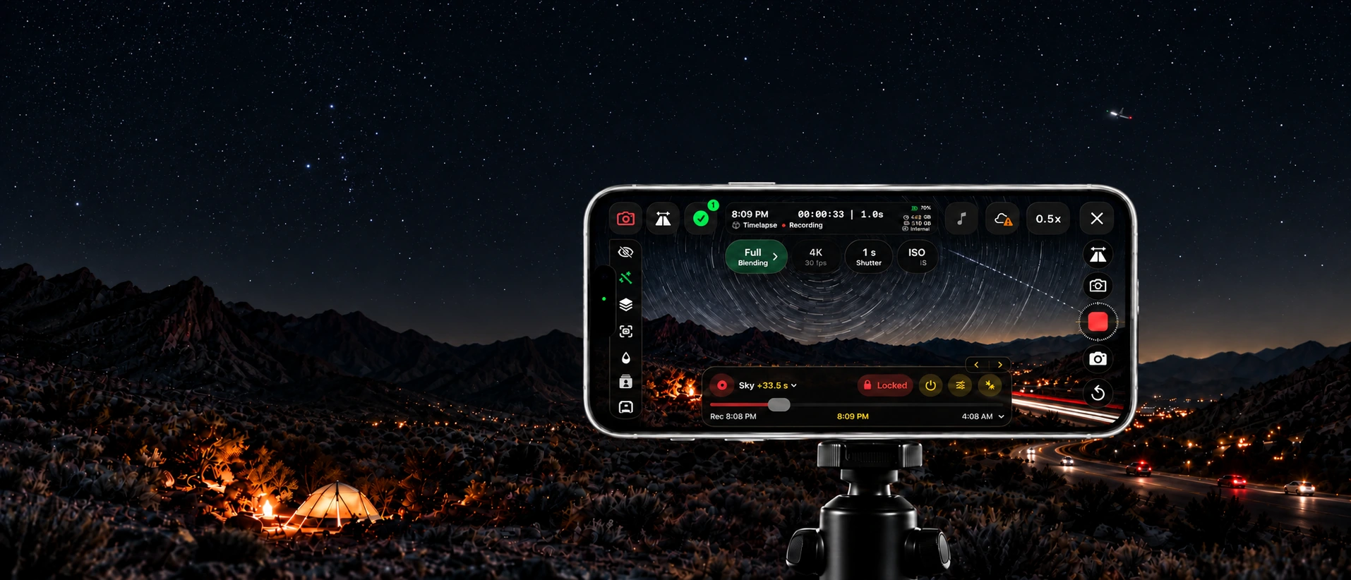 A front-facing TimeLapsed camera on a tripod: point stars and a single aircraft in the actual sky, with accumulated star arcs and a dotted aircraft light trail visible only on the iPhone screen